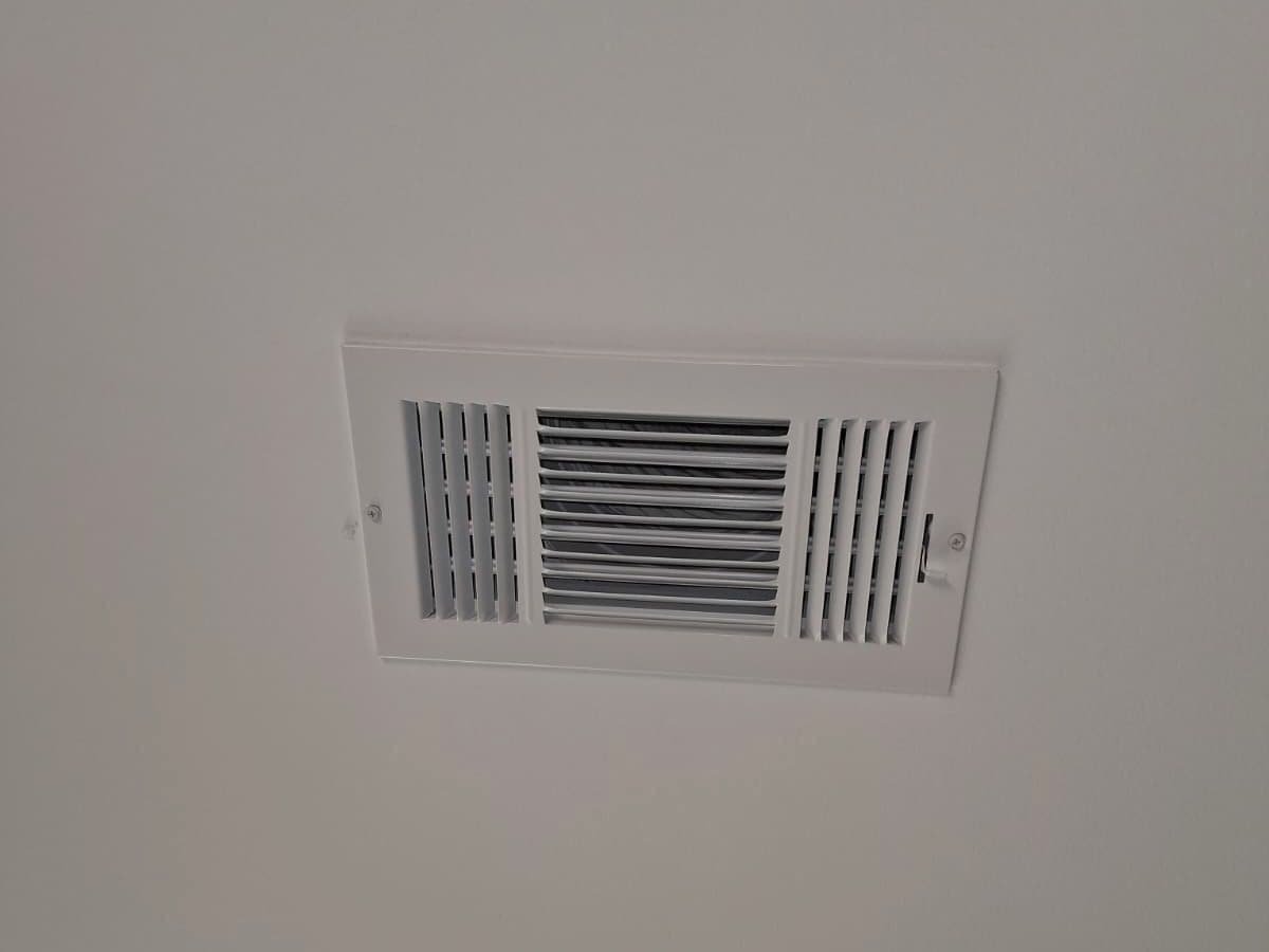 Three-way ceiling supply register installed and finished by Ventura