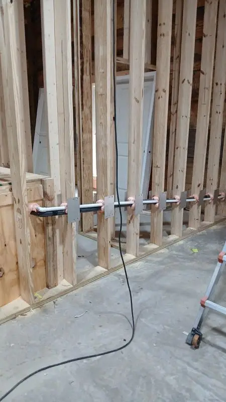 HVAC line set roughed in between wall studs